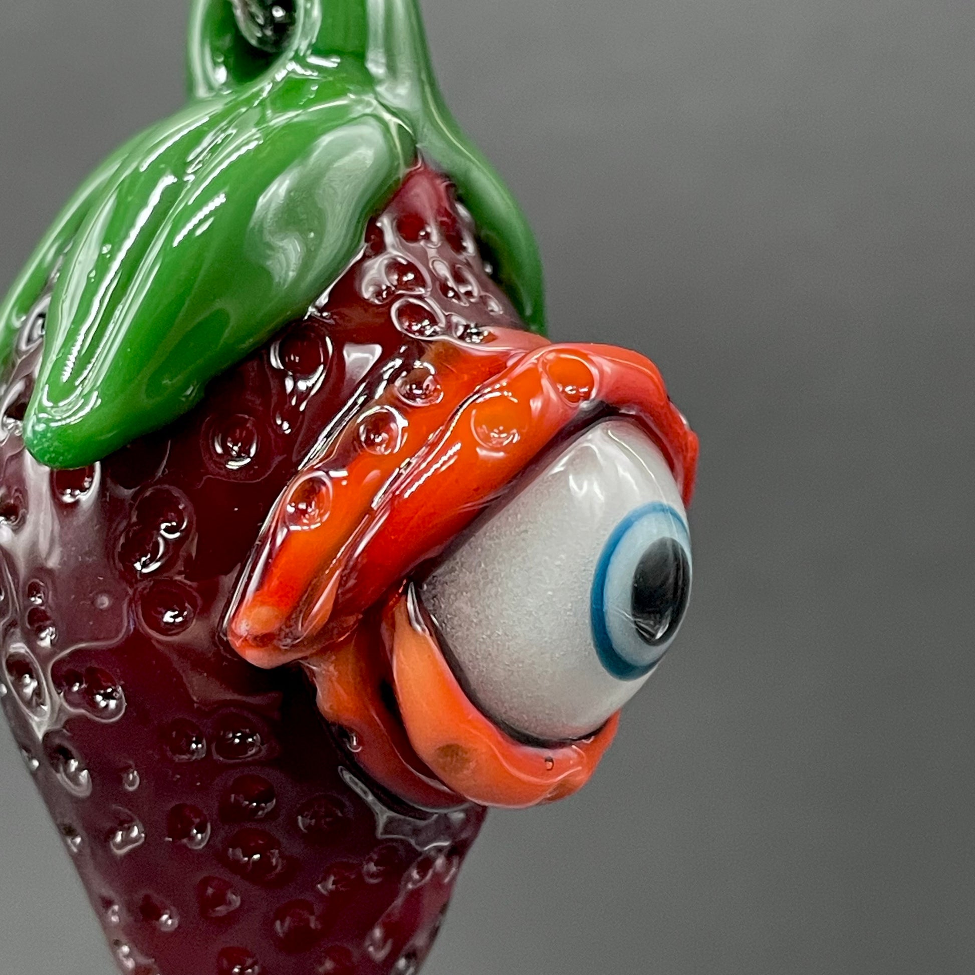 Artisan glass Cyclops strawberry pendant - detailed craftsmanship