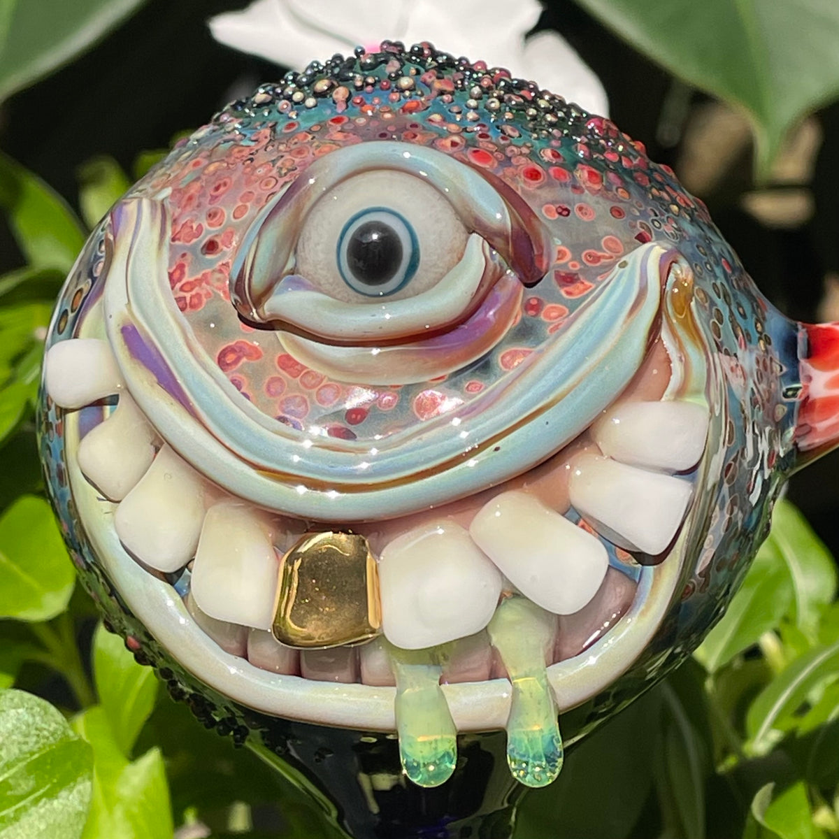 Hand Blown Glass Monster Watering Globe - round cyclops head, blue iris eye, white teeth, gold tooth, teal tongue drips, teal glass stake - Leviathan Glass
