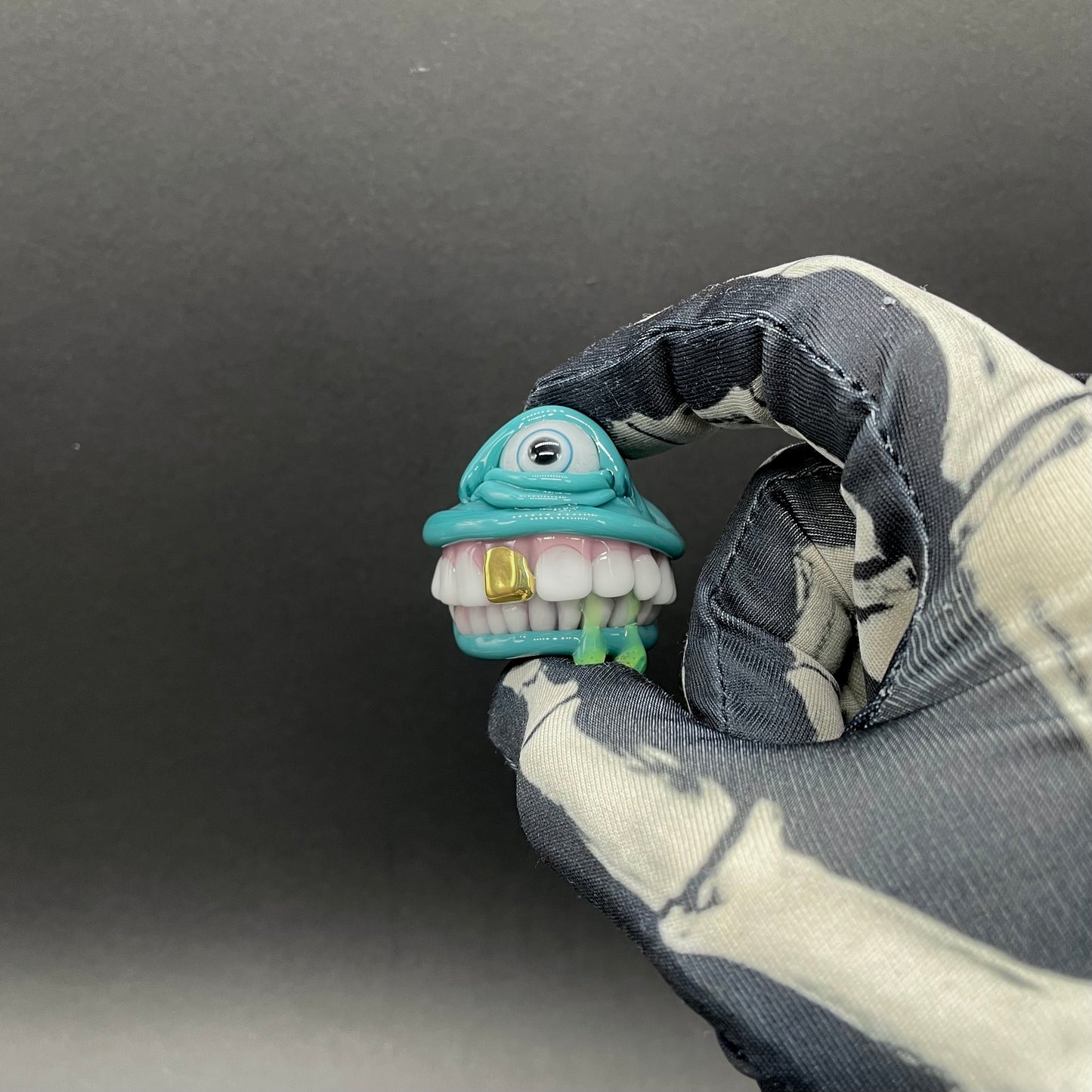 Grinning like a fool glass pendant