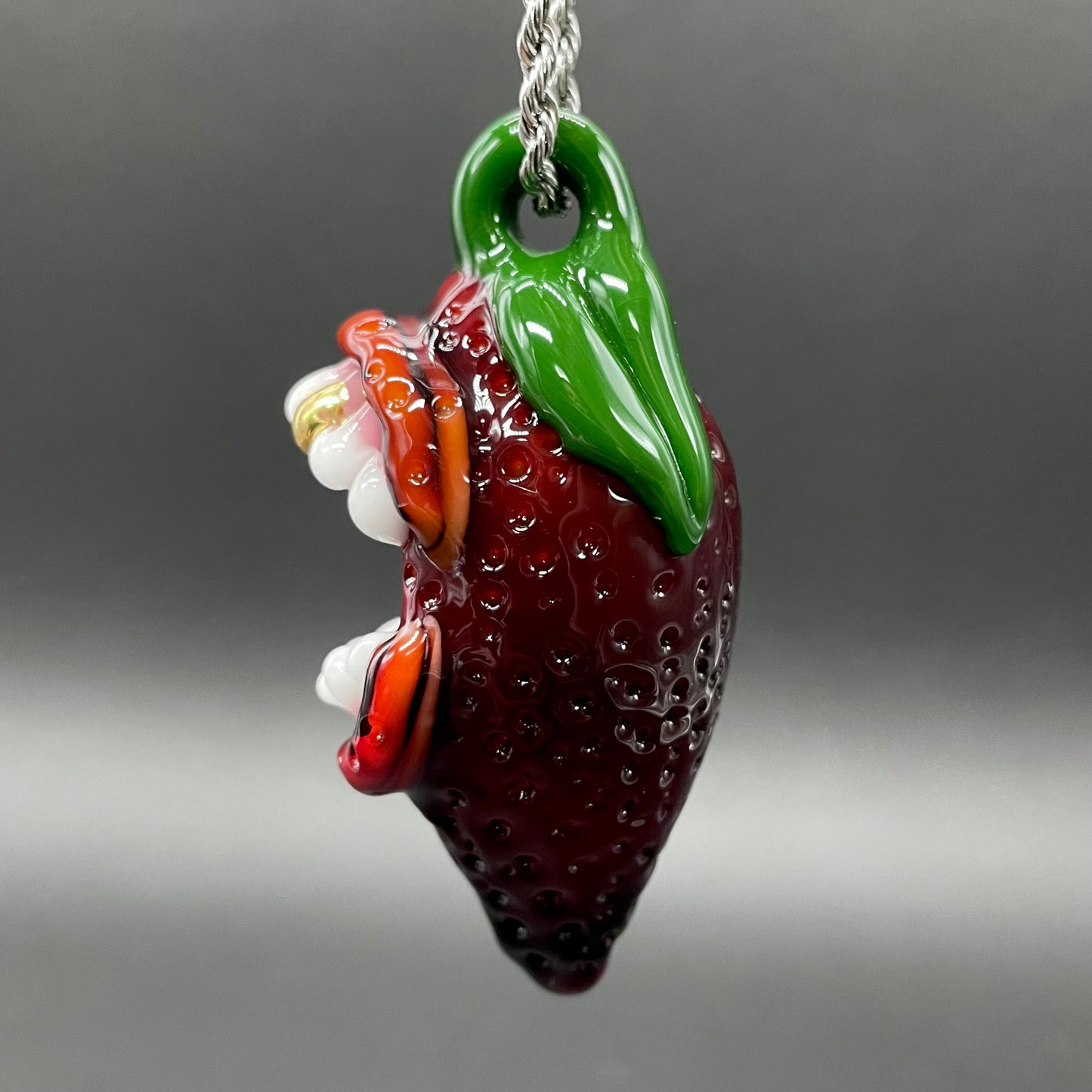 Screaming strawberry glass pendant