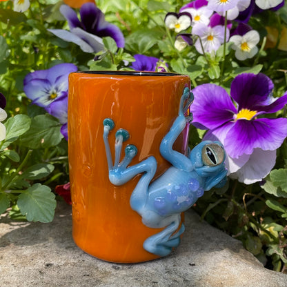 Close-up of poison dart frog shot glass - handcrafted glass