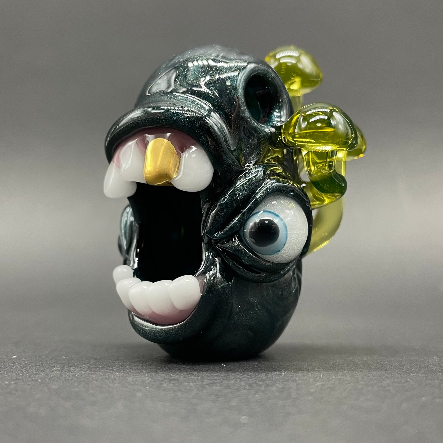 Hand-blown glass Screaming UV reactive mushroom monster pendant by Leviathan Glass