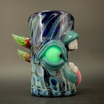 Close-up of Screaming tongue shot glass - handcrafted glass