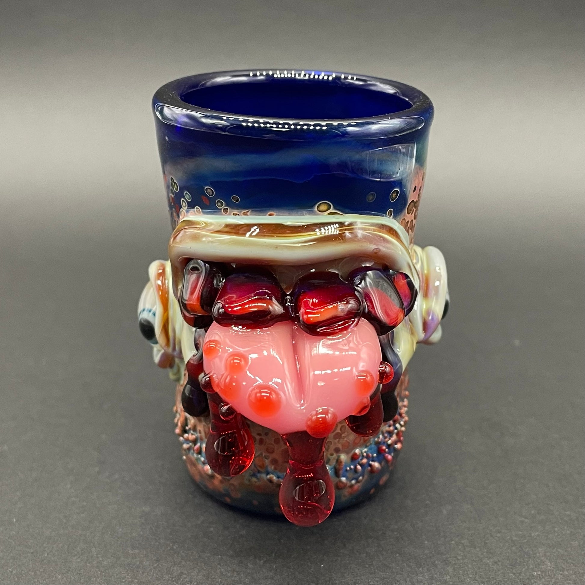Close-up of Taste the rainbow shot glass - handcrafted glass