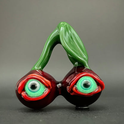 Cherry flavored glass eye pendant