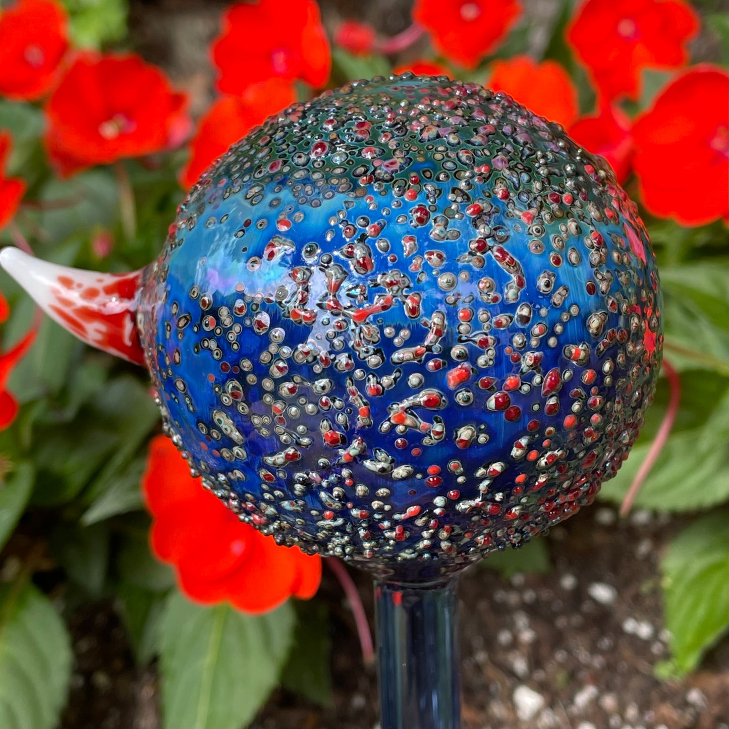 Hand blown glass monster watering globe