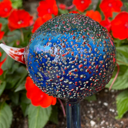 Hand blown glass monster watering globe