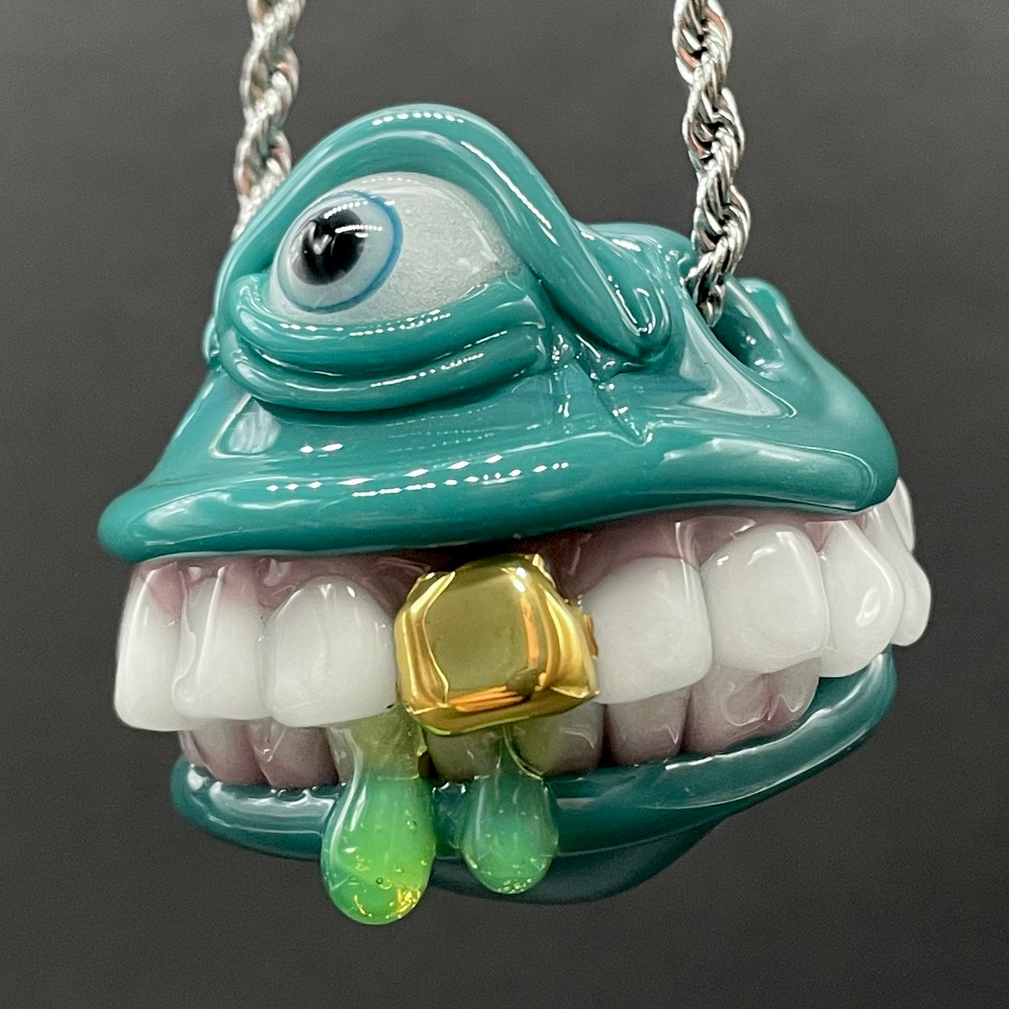 Grinning like a fool glass pendant