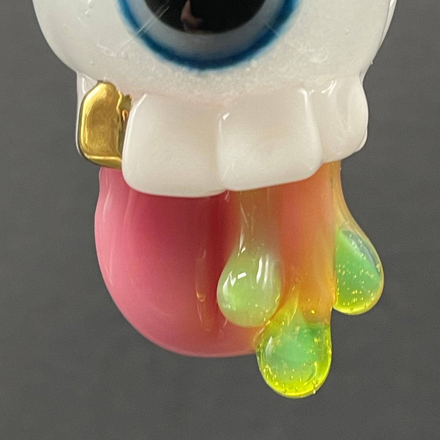 Glow in the dark eye pendant craftsmanship - artisan glass work
