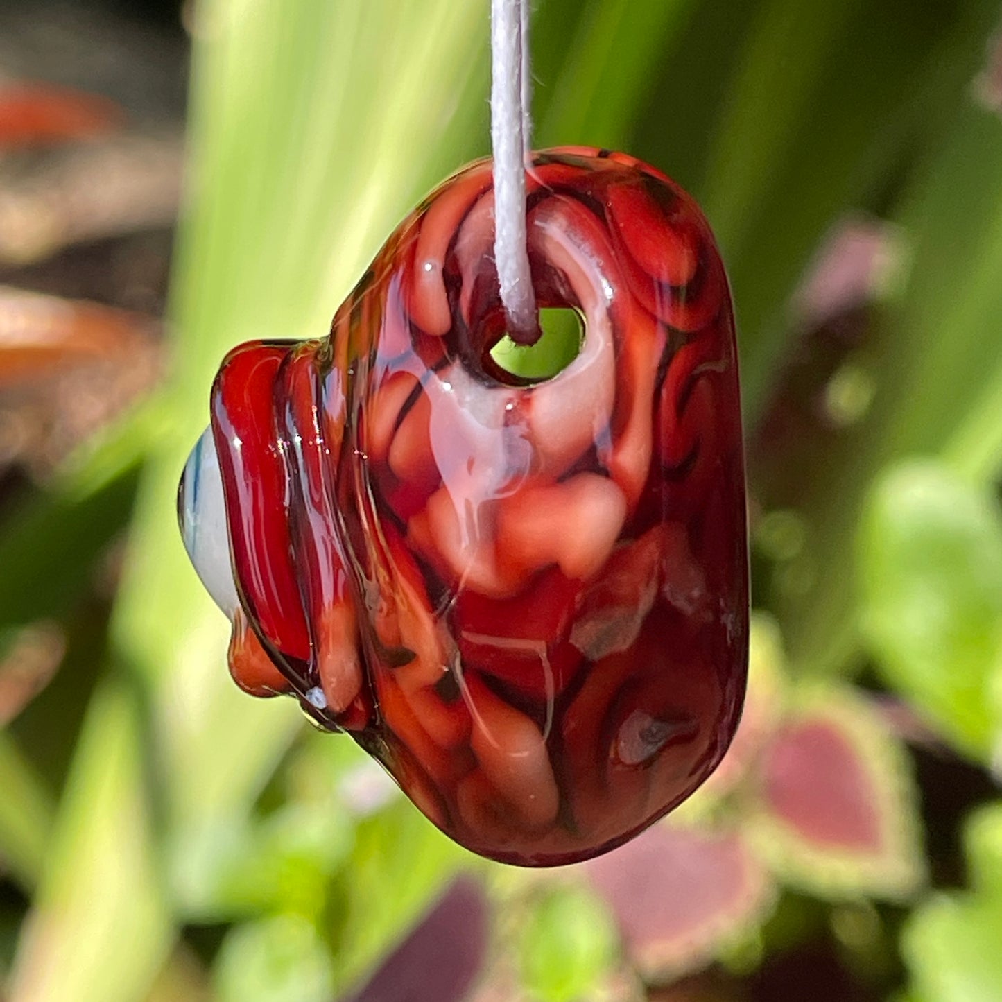 Cyclops brain pendant craftsmanship - artisan glass work