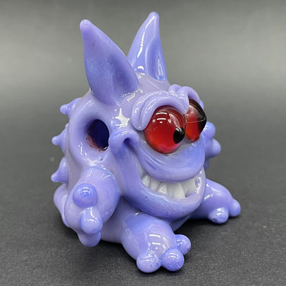 Gengar Pokémon handblown glass pendant - periwinkle purple Gengar sculpture, large red glass eyes, white teeth, clawed hands and feet, silver rope chain - Leviathan Glass