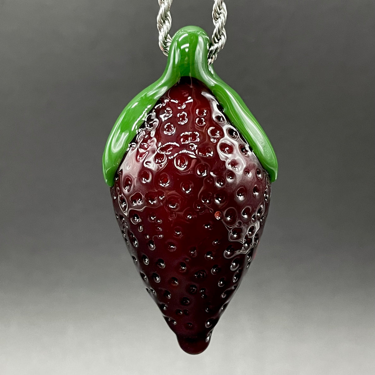 Screaming strawberry glass pendant