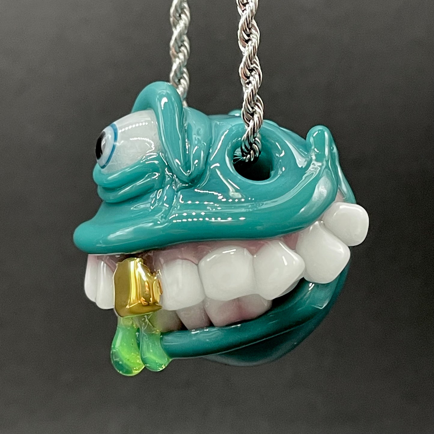 Grinning like a fool glass pendant