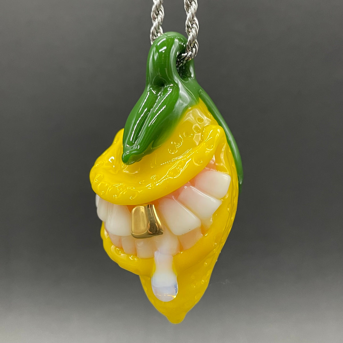 Grinning lemon pendant