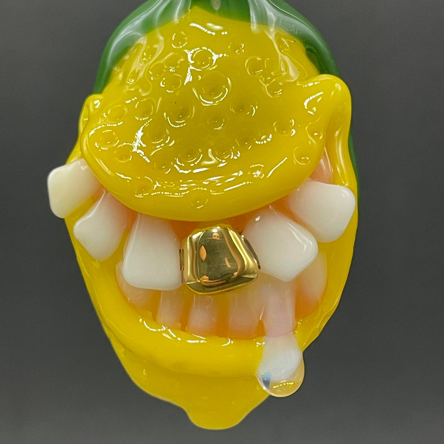 Grinning lemon pendant