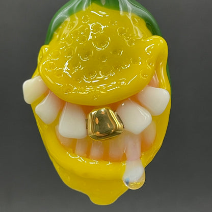 Grinning lemon pendant