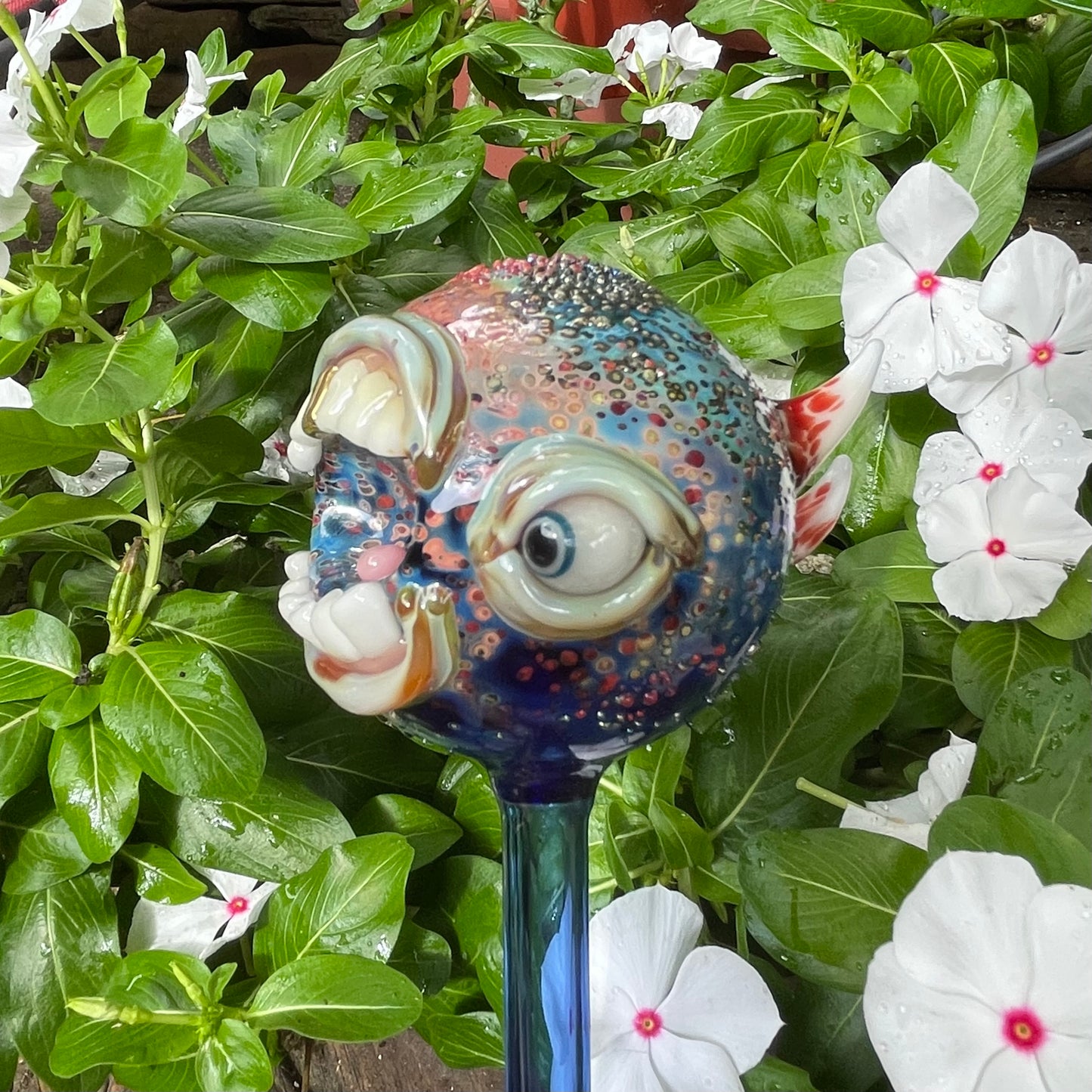 Hand blown glass monster watering globe