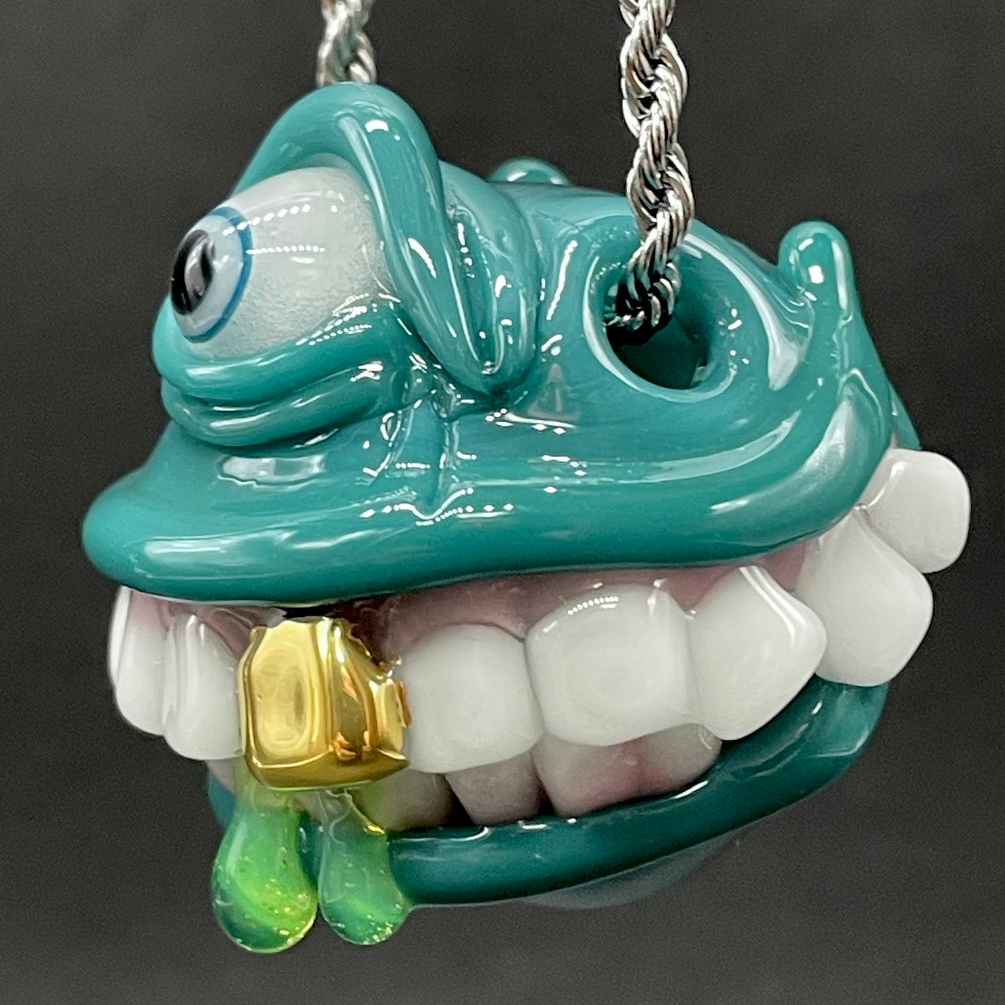 Grinning like a fool glass pendant