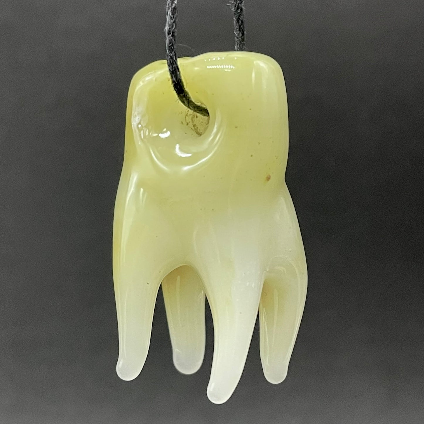 3 glass tooth beads by Leviathan Glass - artisan detail