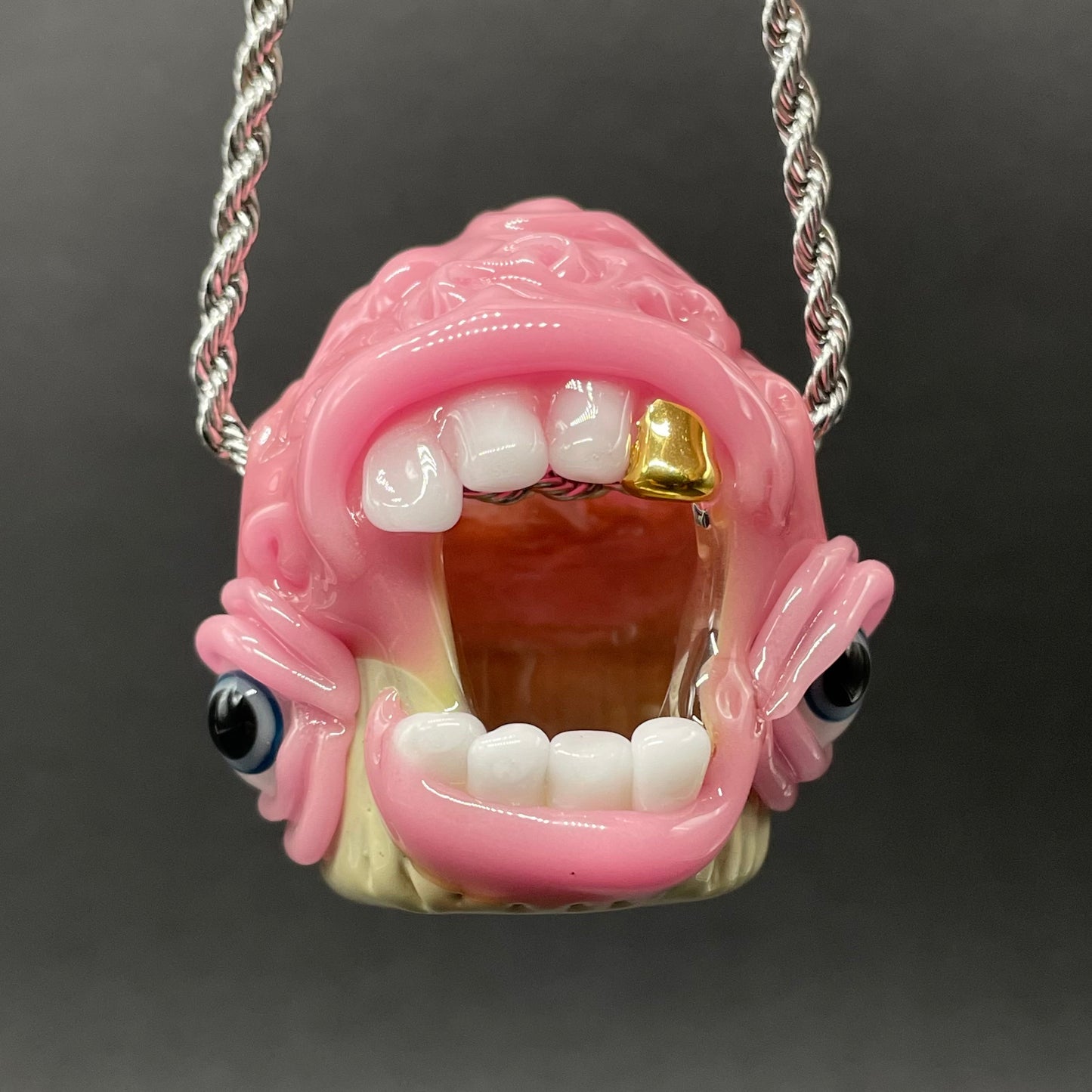 Close-up of Cupcake pendant - handcrafted glass