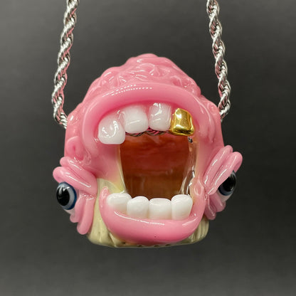 Close-up of Cupcake pendant - handcrafted glass