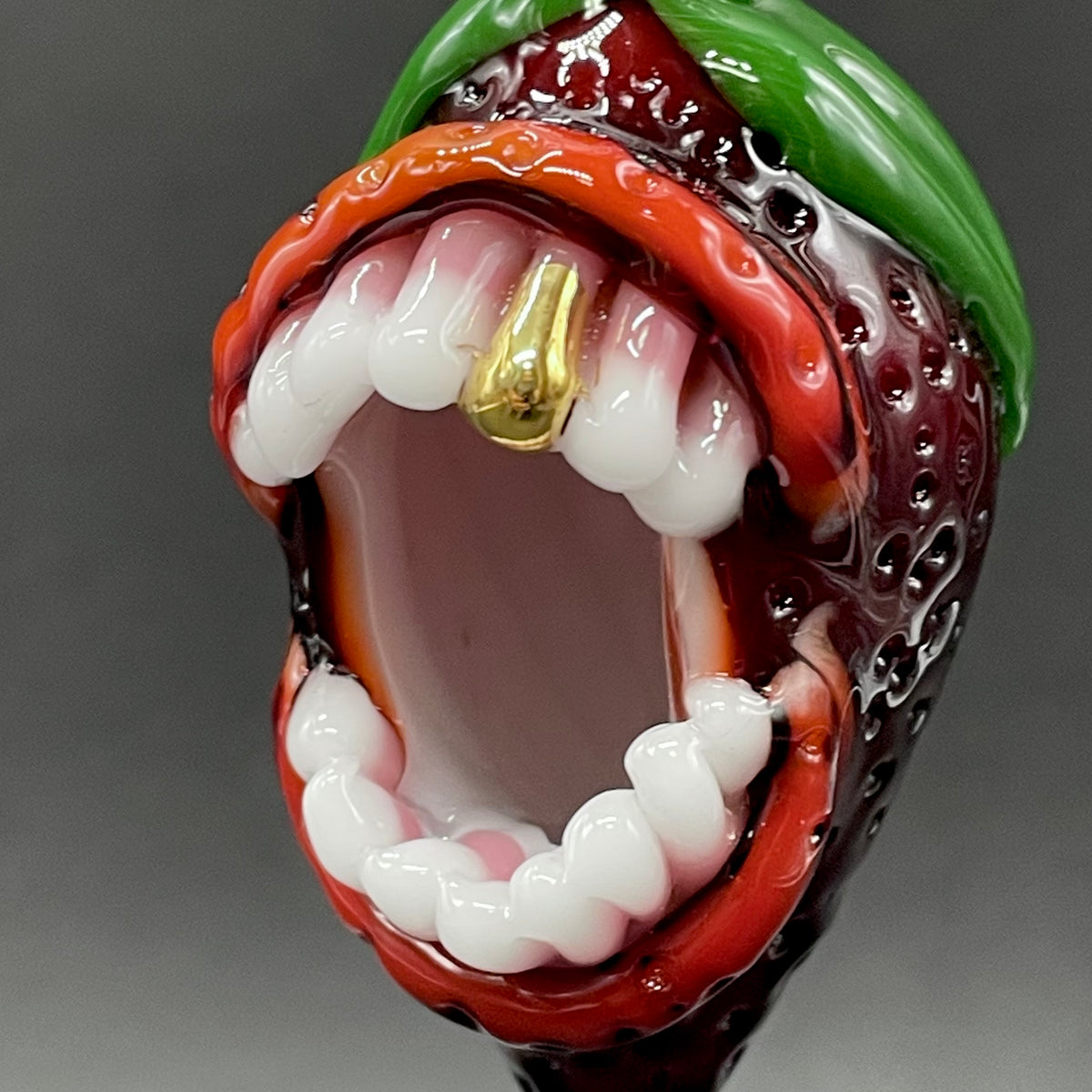 Screaming strawberry glass pendant