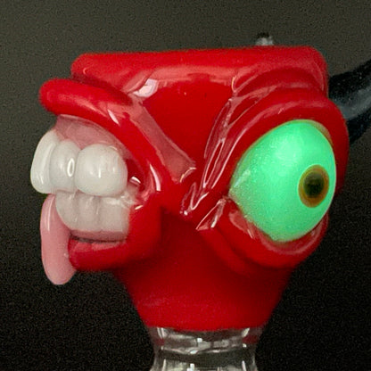 Close-up of 14mm 4 hole UV reactive slide - handcrafted glass
