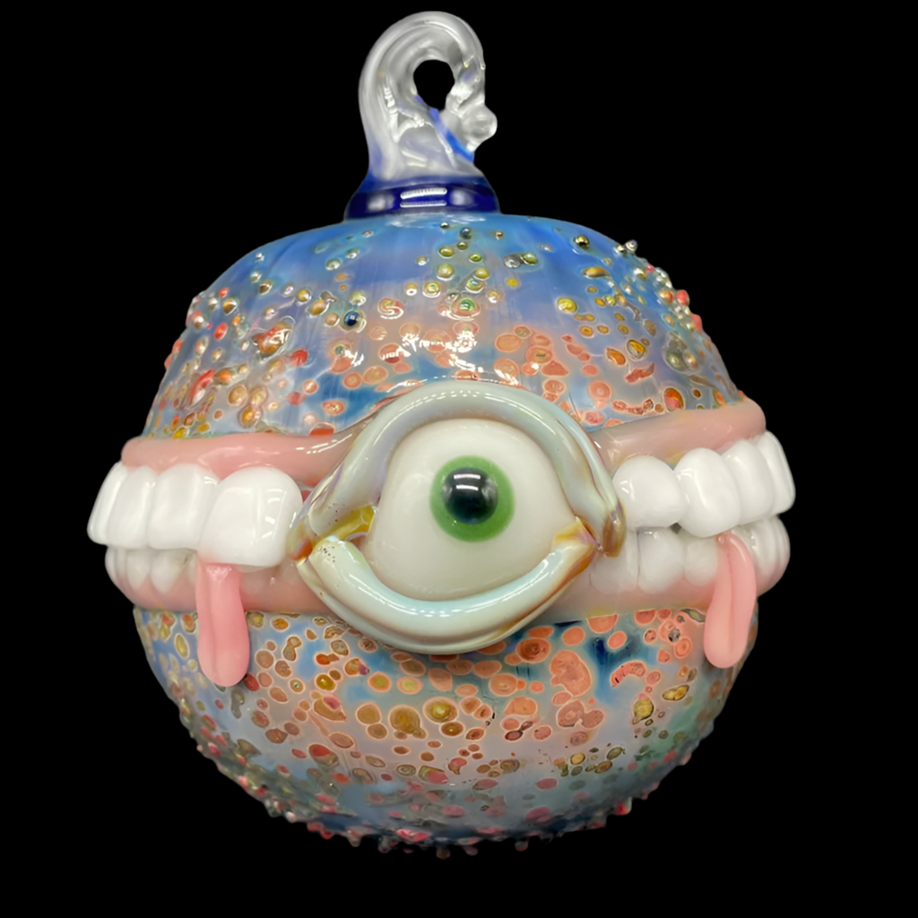 Hand-blown glass Too many teeth ornament by Leviathan Glass