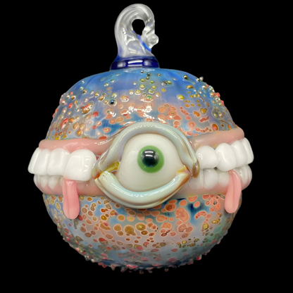 Hand-blown glass Too many teeth ornament by Leviathan Glass