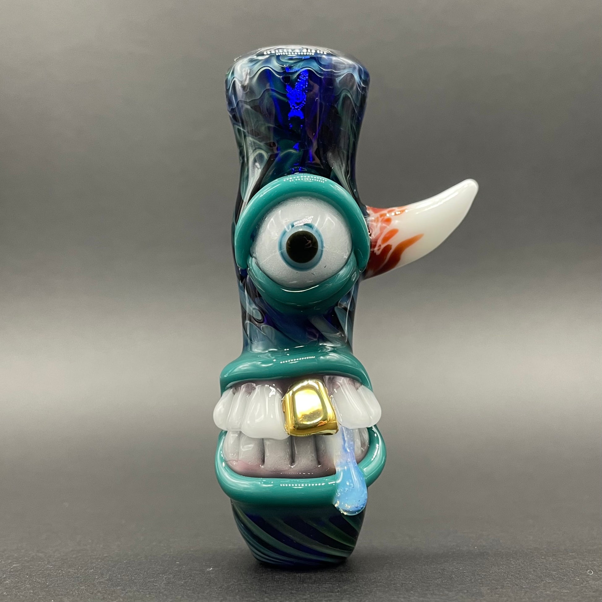 Gold fumed cyclops Chillum detail view - premium glass art