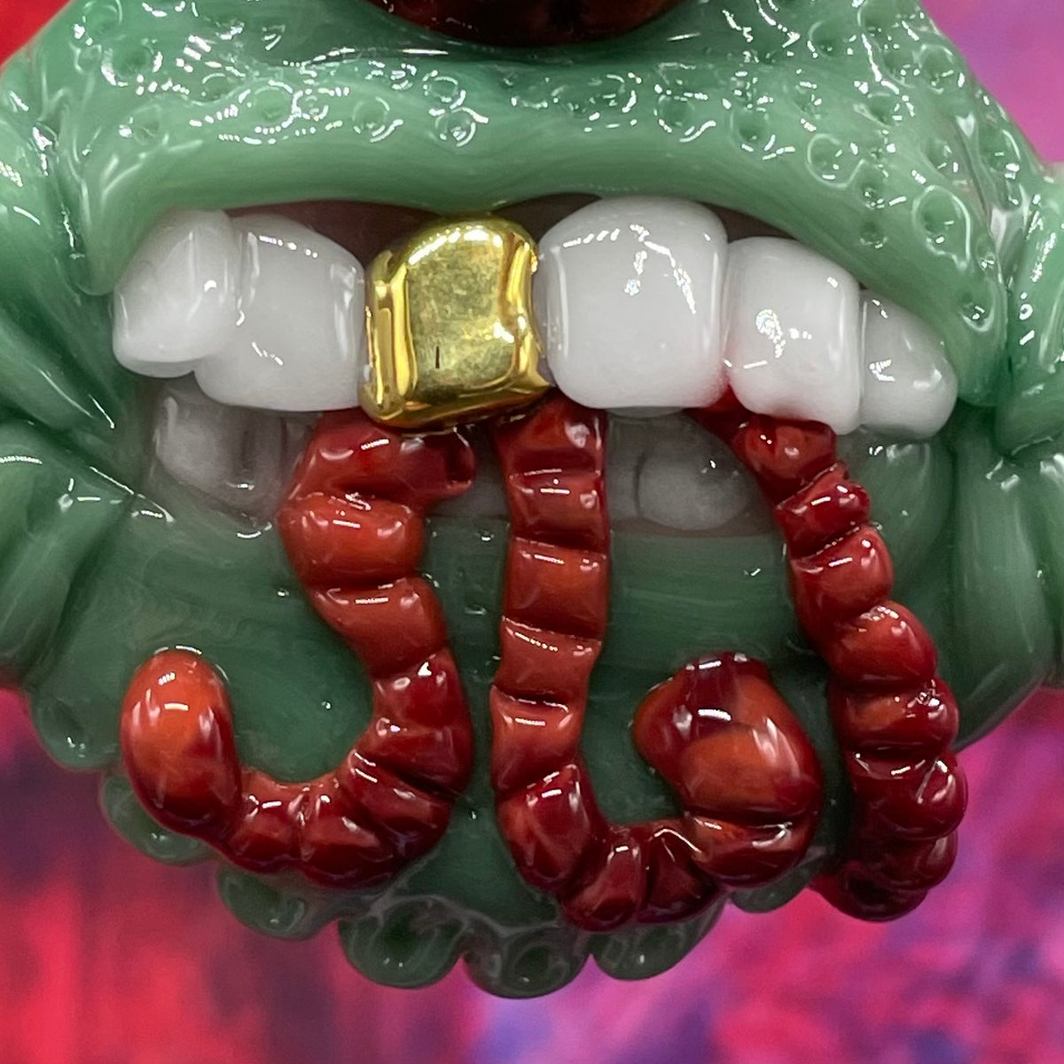 Worm eater pendant