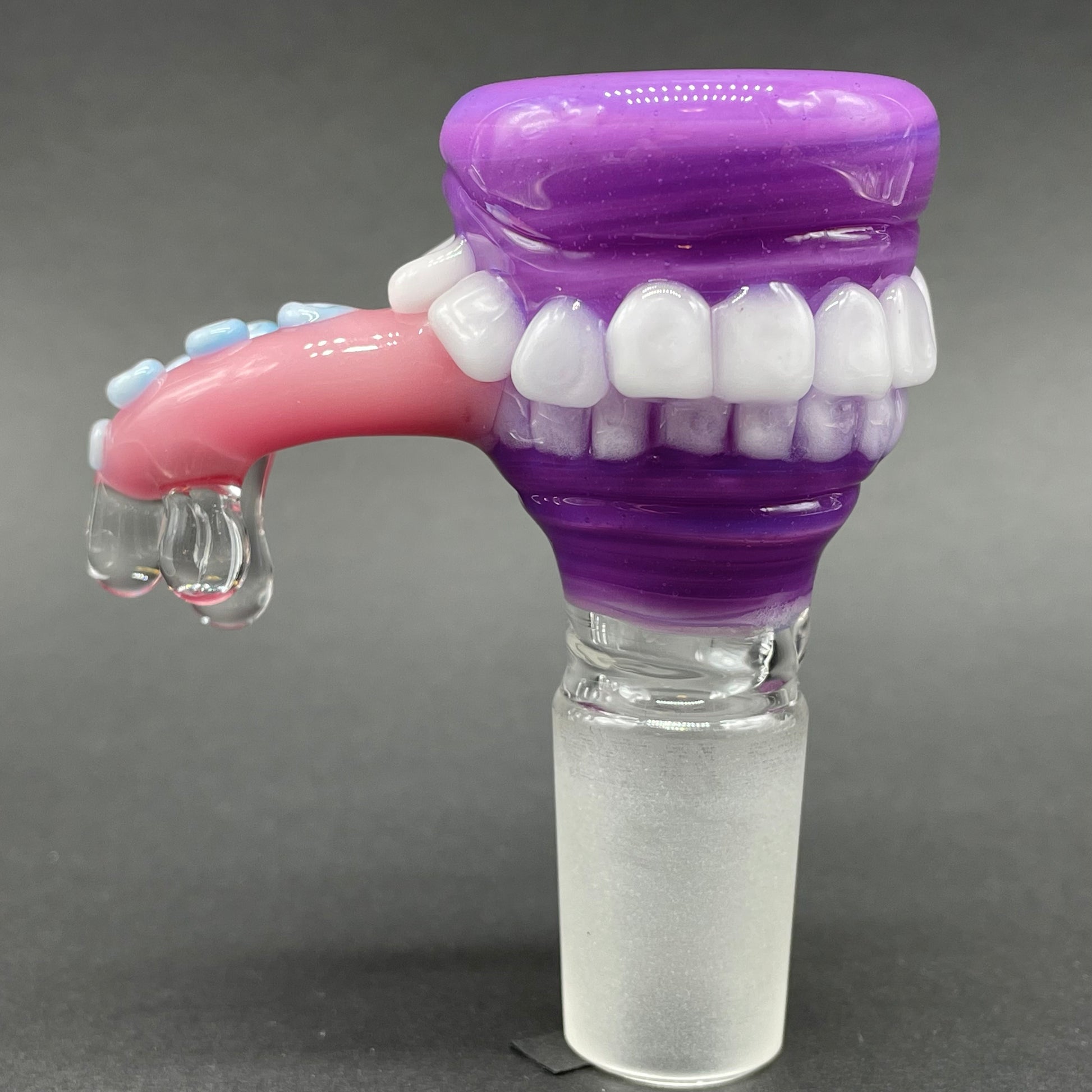 Close-up of 18mm tentacle tongue slide. - handcrafted glass