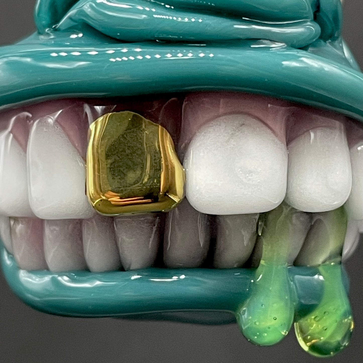 Grinning like a fool glass pendant