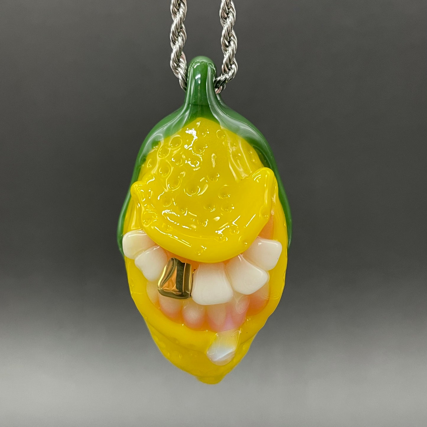 Grinning lemon pendant