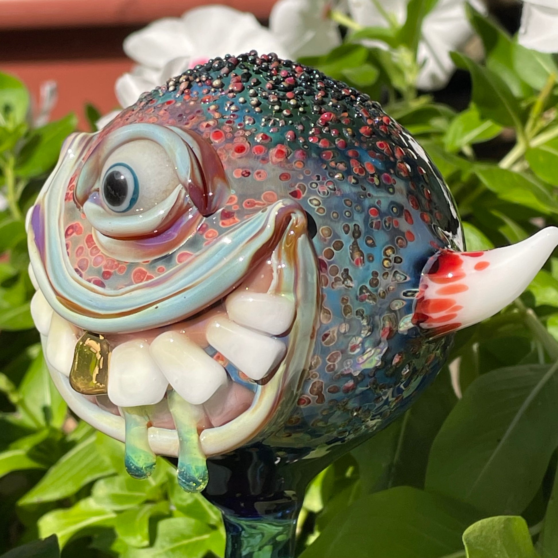 Hand Blown Glass Monster Watering Globe - round cyclops head, blue iris eye, white teeth, gold tooth, teal tongue drips, teal glass stake - Leviathan Glass