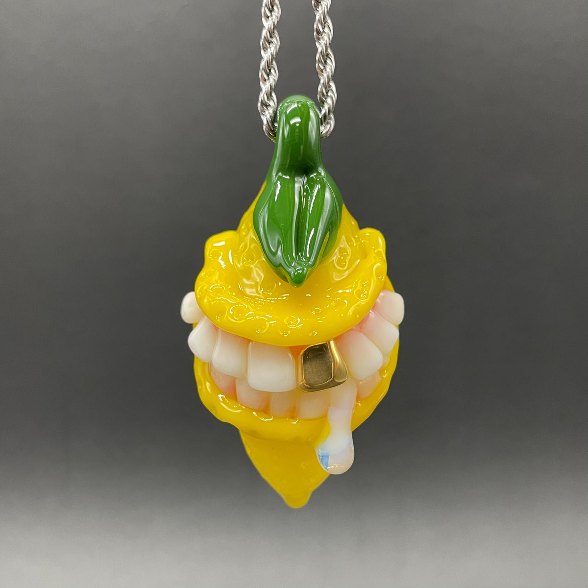 Grinning lemon pendant