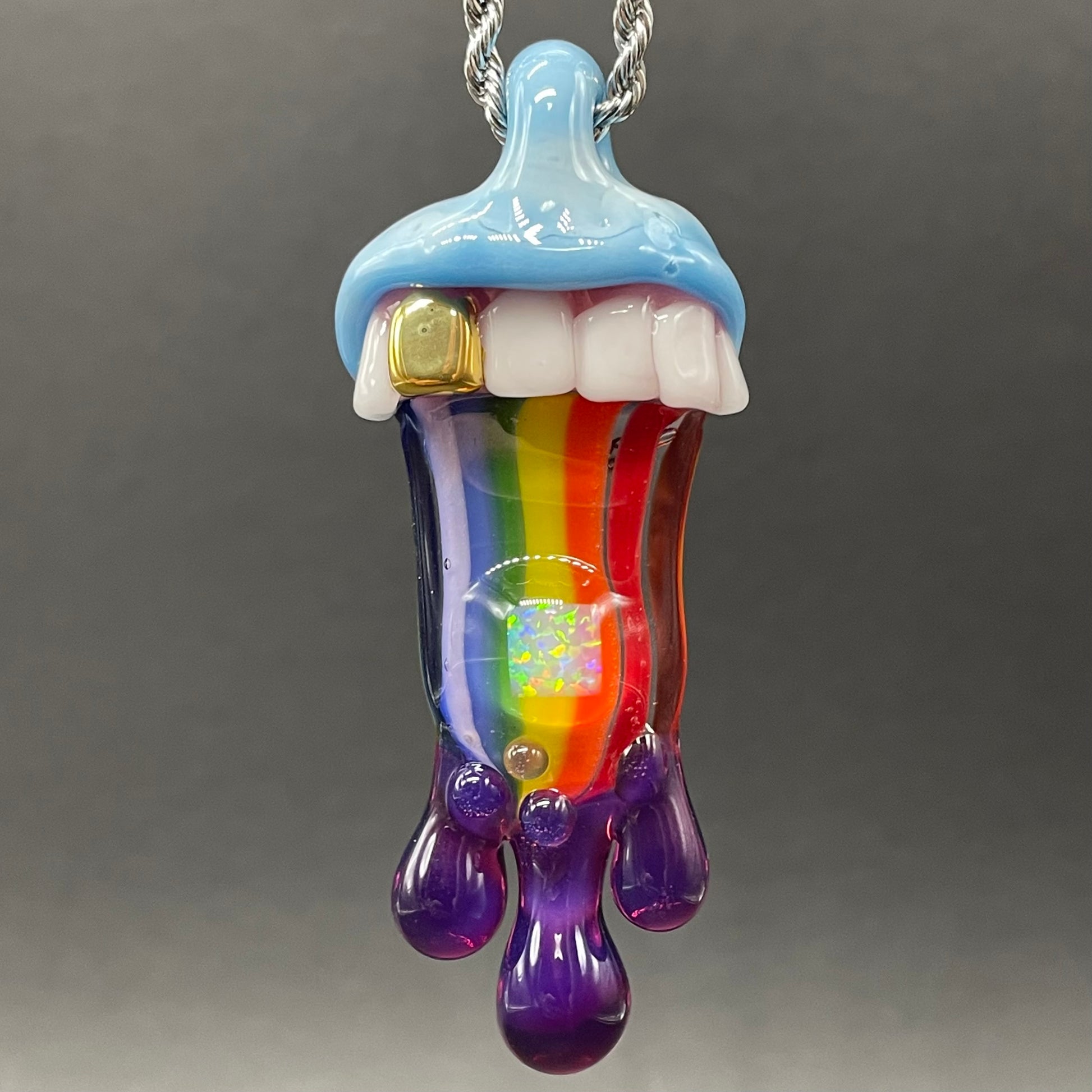 Glass opal rainbow tongue pendant detail view - premium glass art