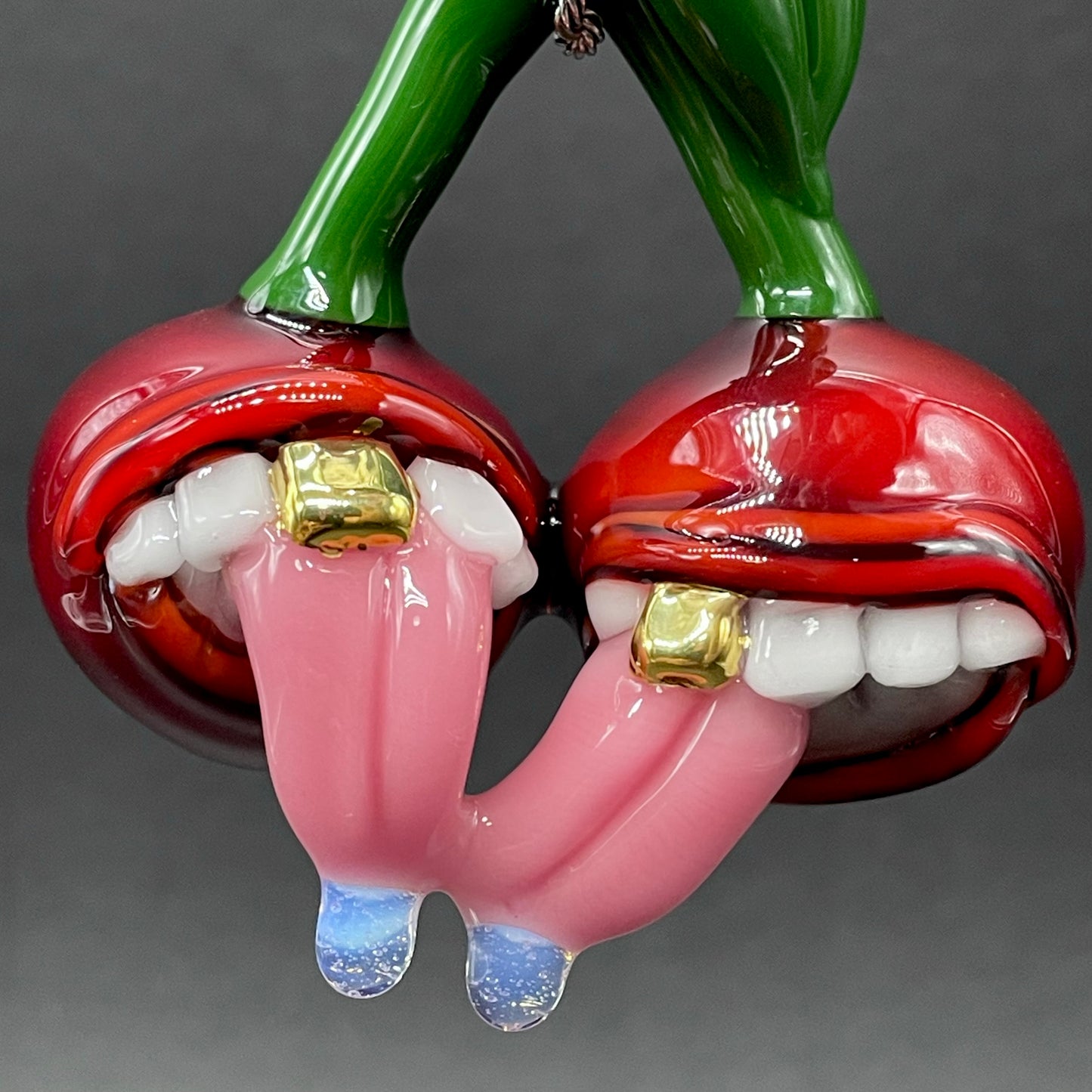 Close-up of Cherry lover pendant - handcrafted glass