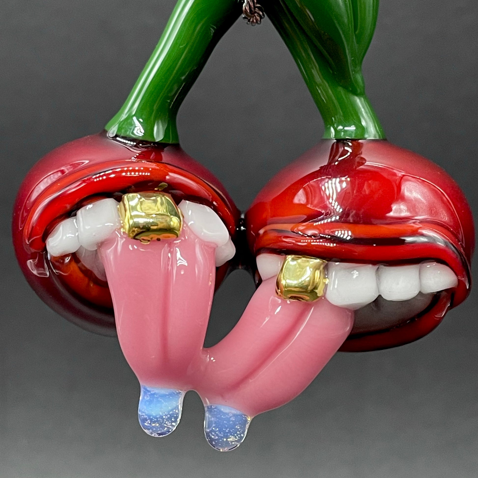Close-up of Cherry lover pendant - handcrafted glass