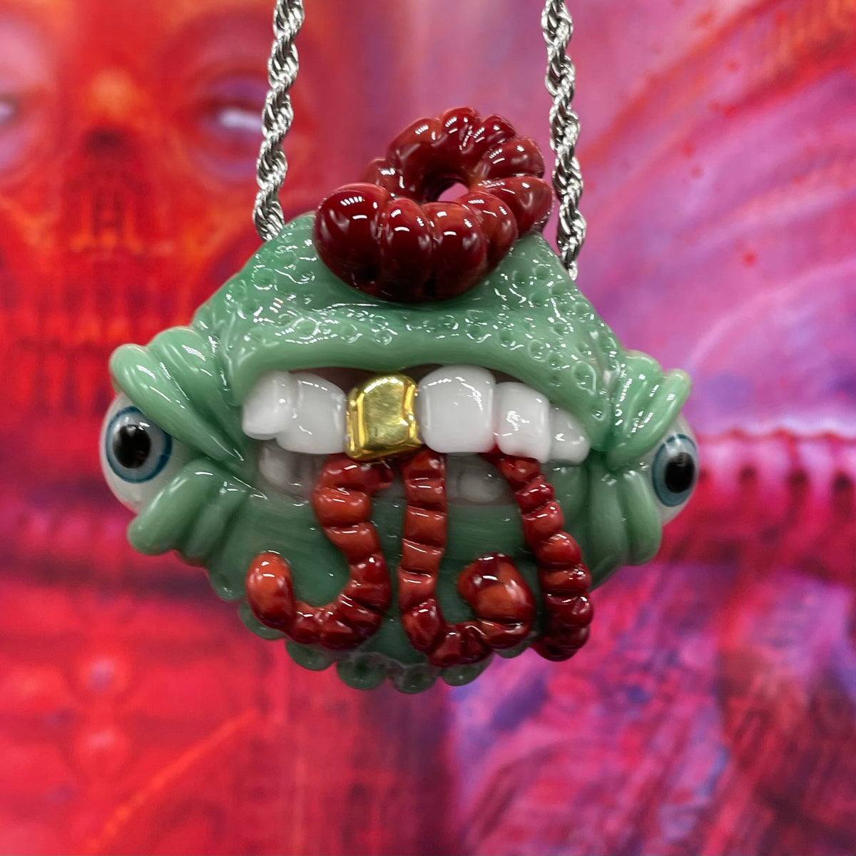 Worm eater pendant