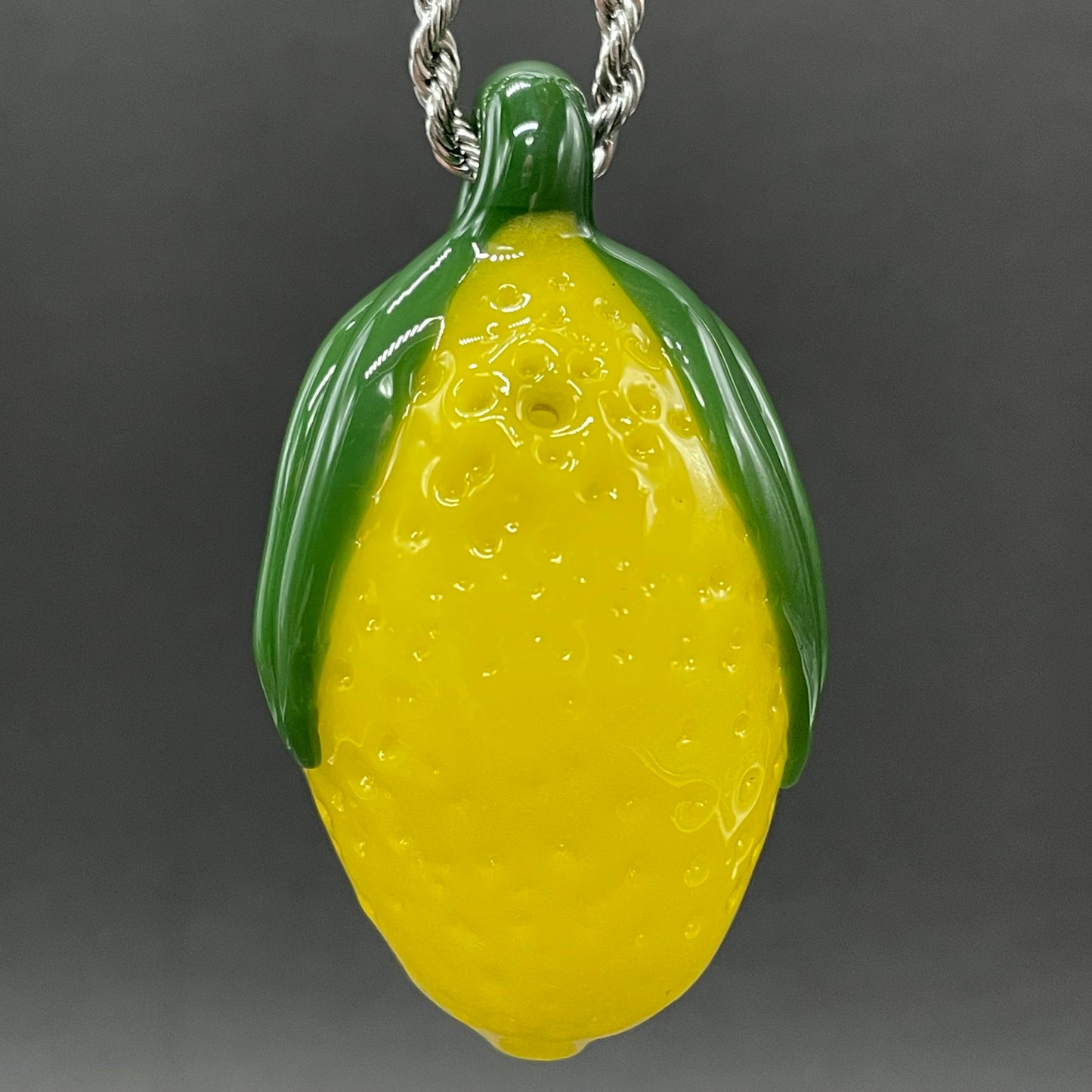 Grinning lemon pendant
