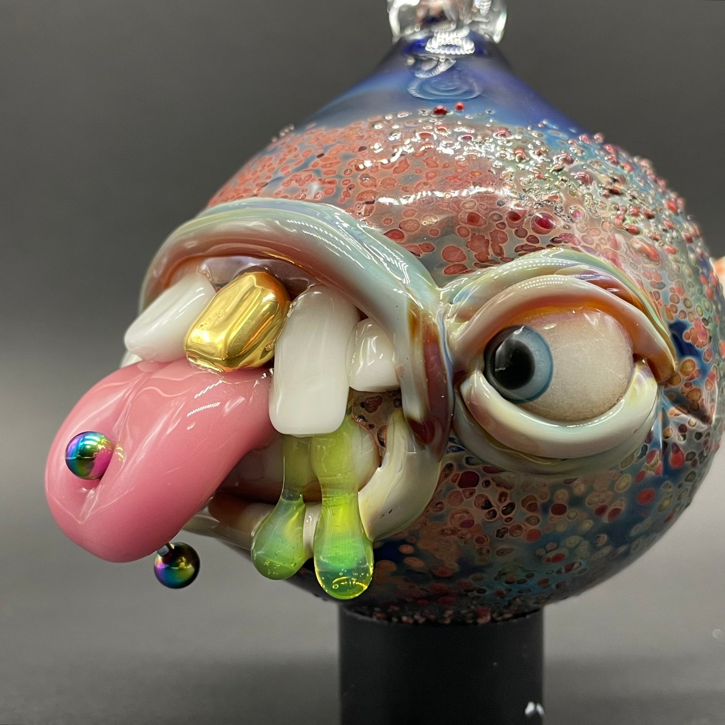 Pierced tongue cyclops ornament by Leviathan Glass - artisan detail