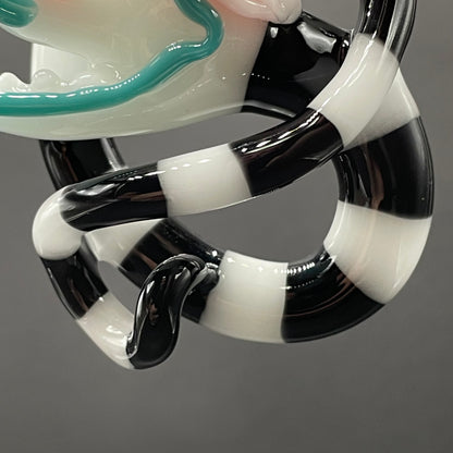 Beetlejuice Inspired handblown solid glass Sandworm sculpture - coiled black and white striped sandworm with white worm head, teal tongue, red eyes - Leviathan Glass
