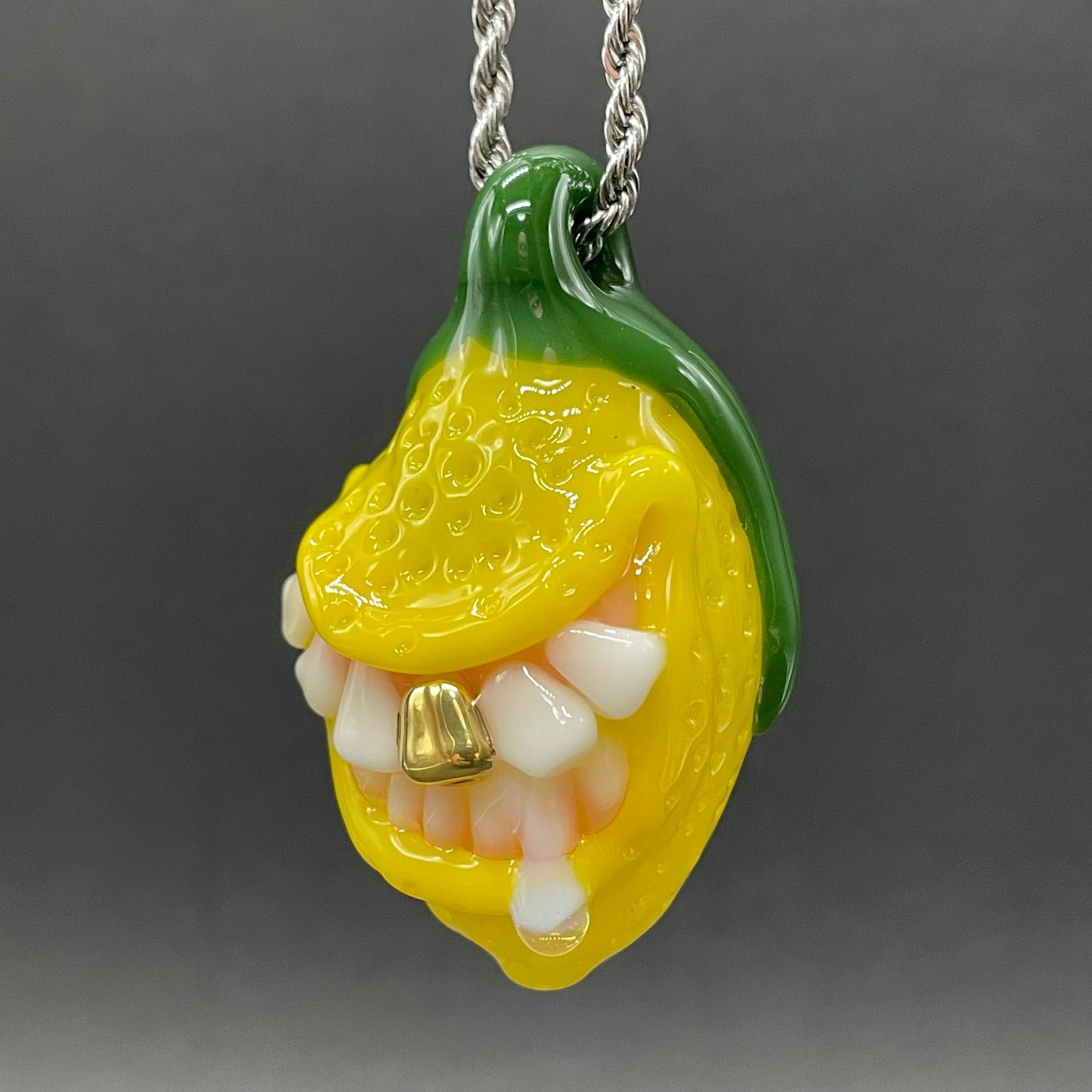 Grinning lemon pendant