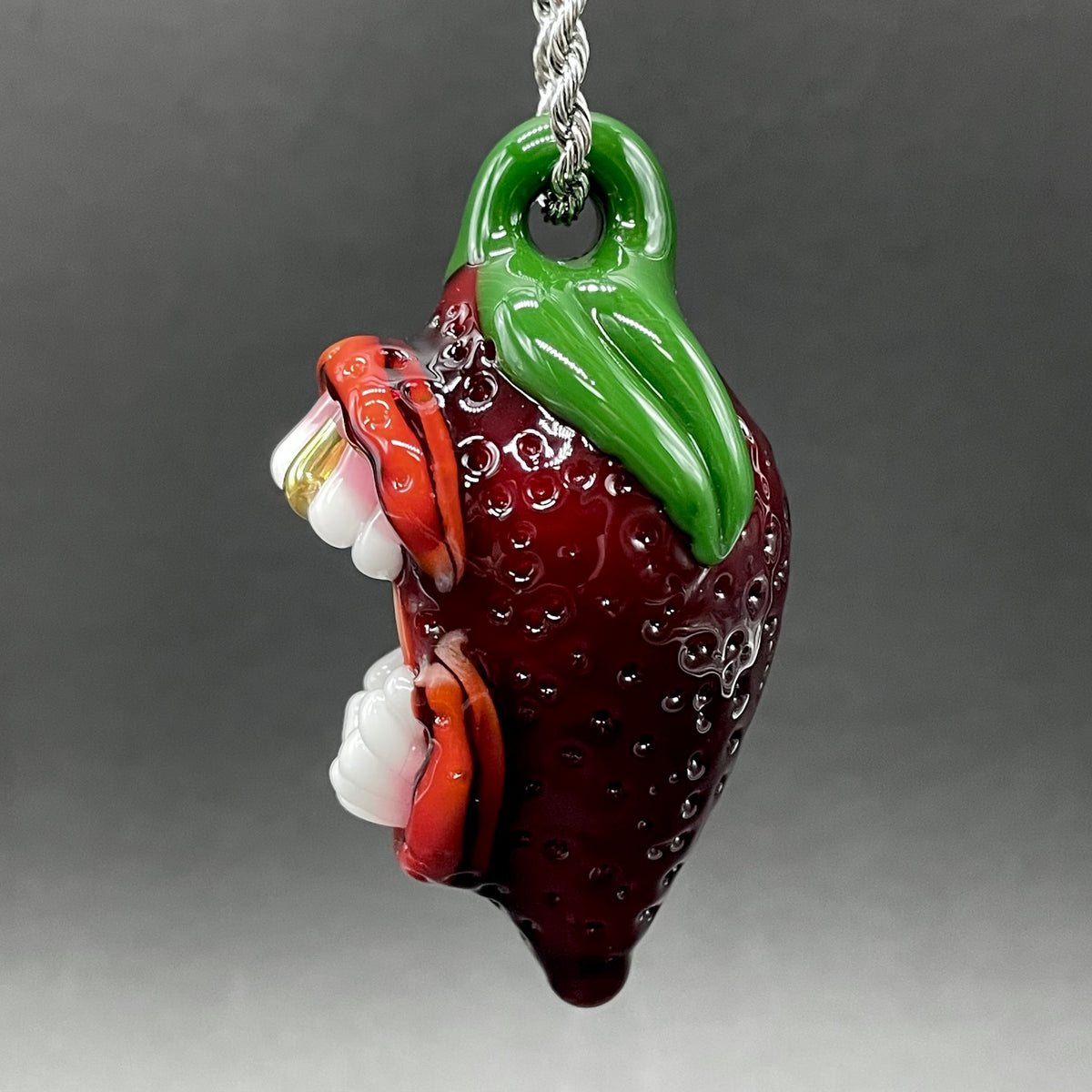 Screaming strawberry glass pendant