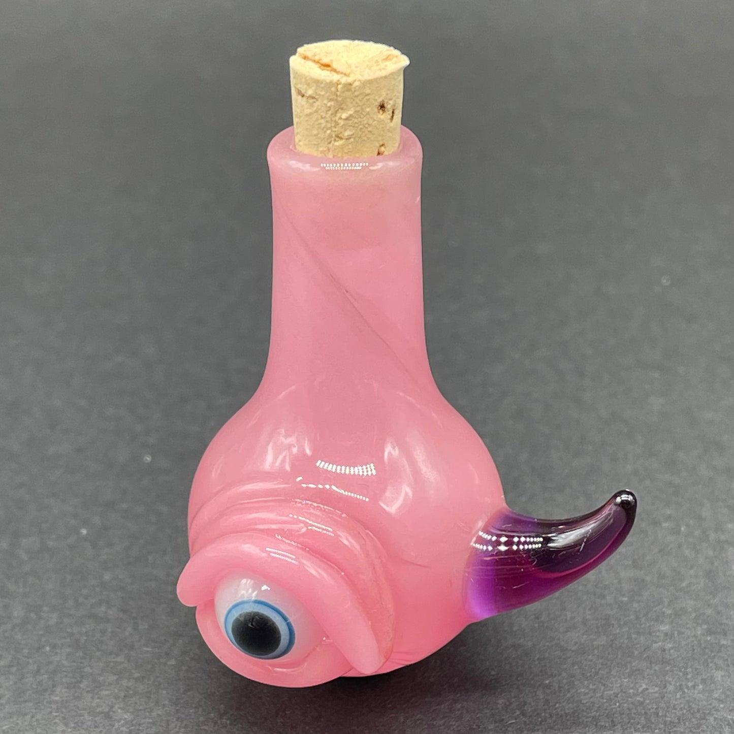 Artisan glass Pink cyclops potion bottle - detailed craftsmanship