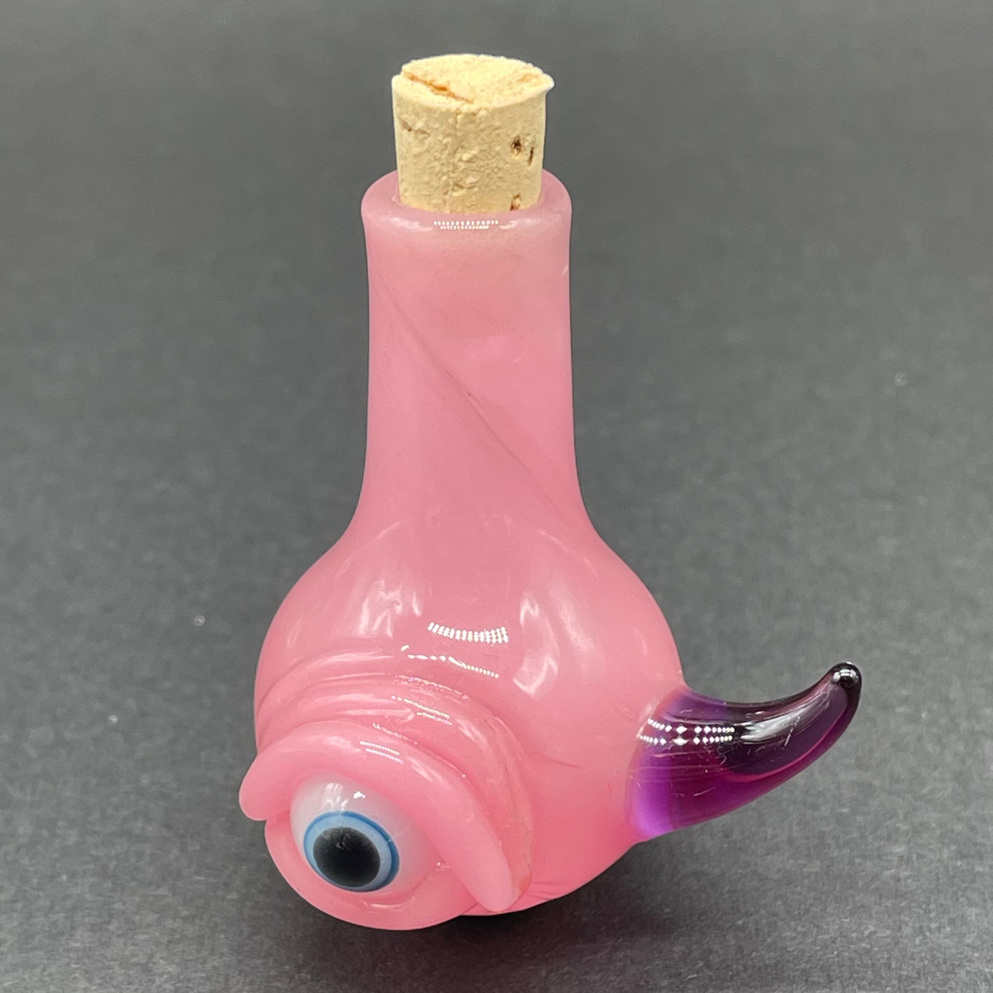 Artisan glass Pink cyclops potion bottle - detailed craftsmanship