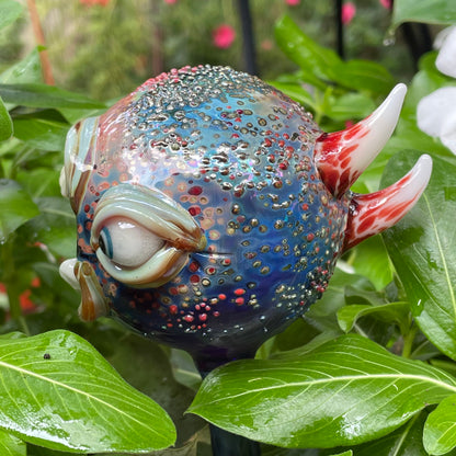 Hand blown glass monster watering globe