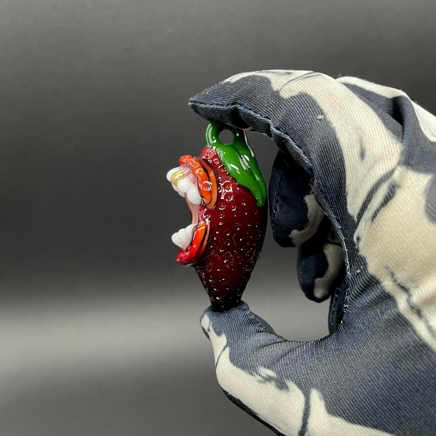 Screaming strawberry glass pendant