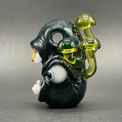 Screaming UV reactive mushroom monster pendant by Leviathan Glass - artisan detail